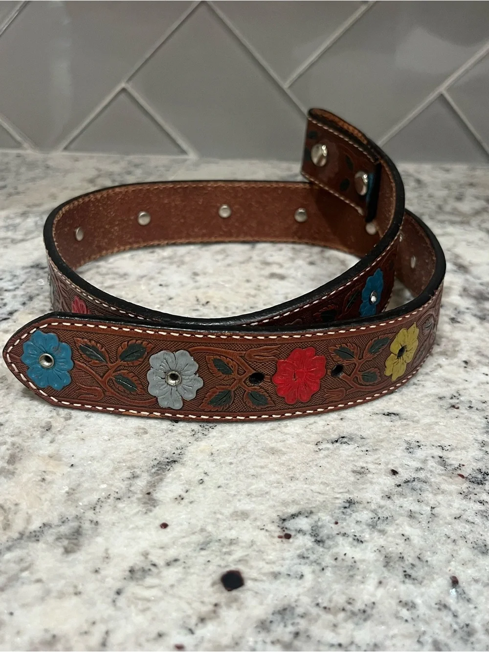 Nocona genuine leather tooled belt size 24- measures 28 3/4”